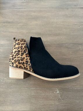 Vogue Women’s Black Suede Ankle Boot with Leopard Heel Accent
